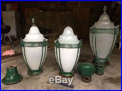 Vintage street lamps large four cast iron polls and three glass globes